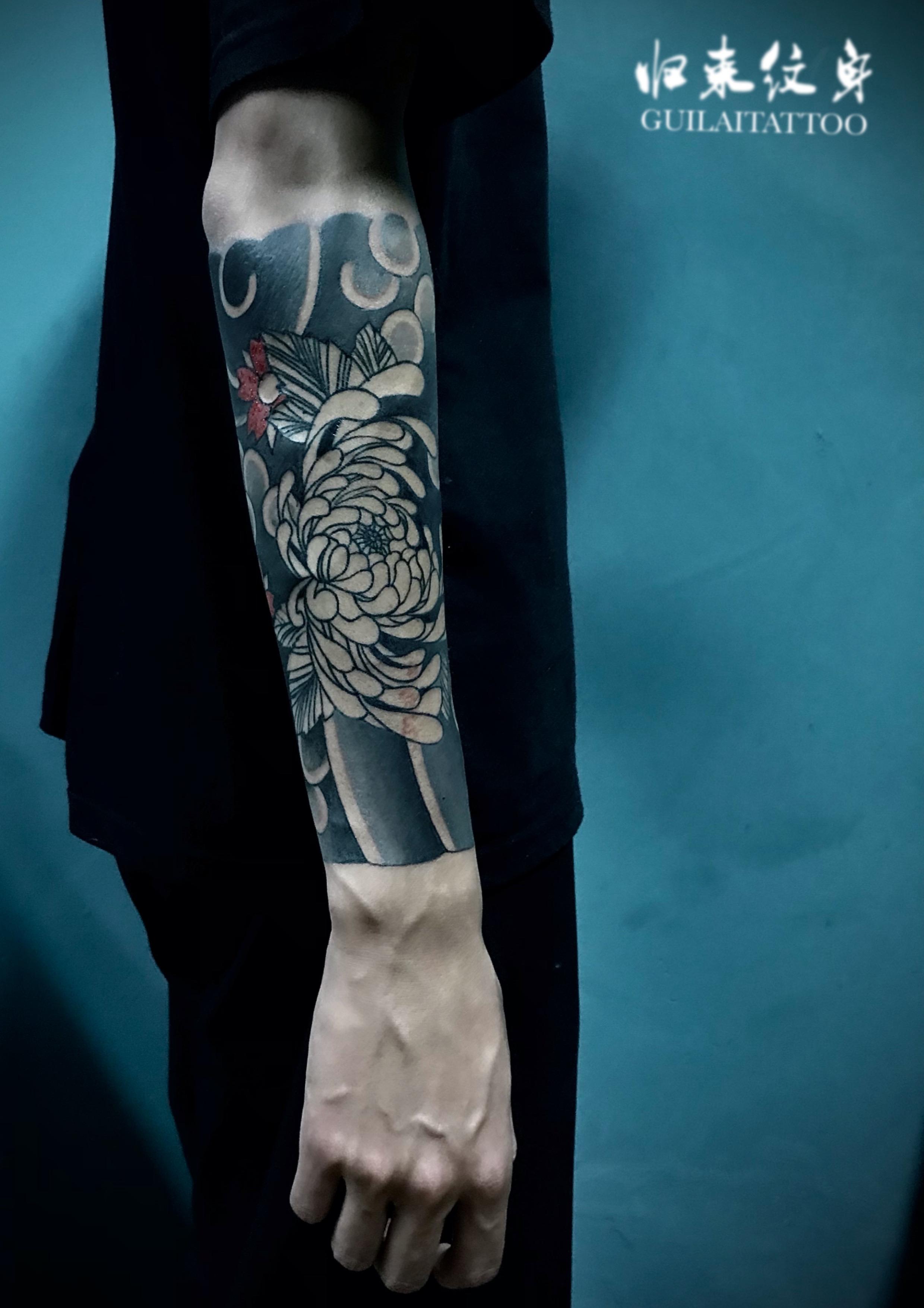 知乎用户igderh 的想法: 菊花半臂纹身