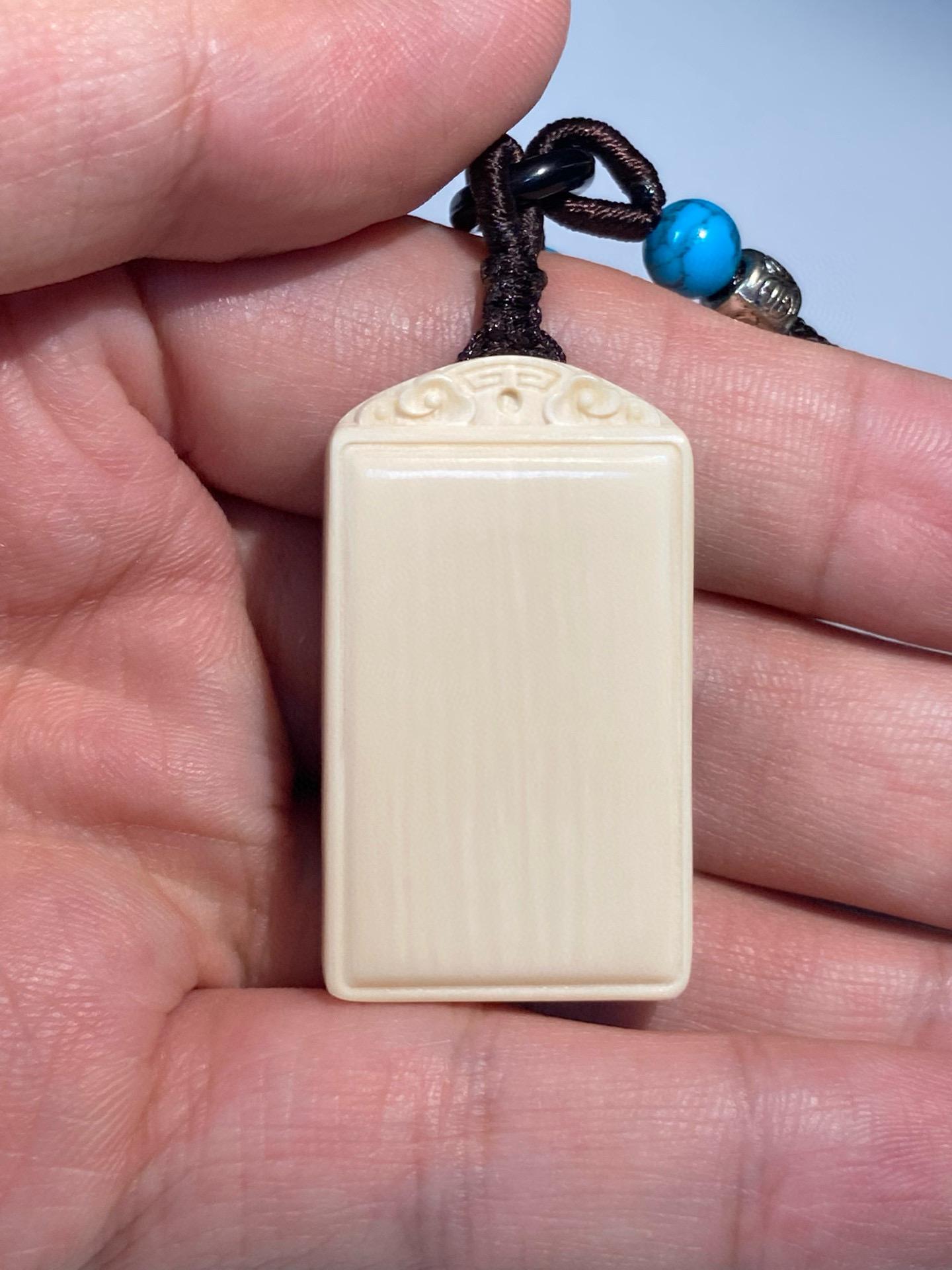 文玩老铺 的想法: 猛犸象牙平安牌吊坠