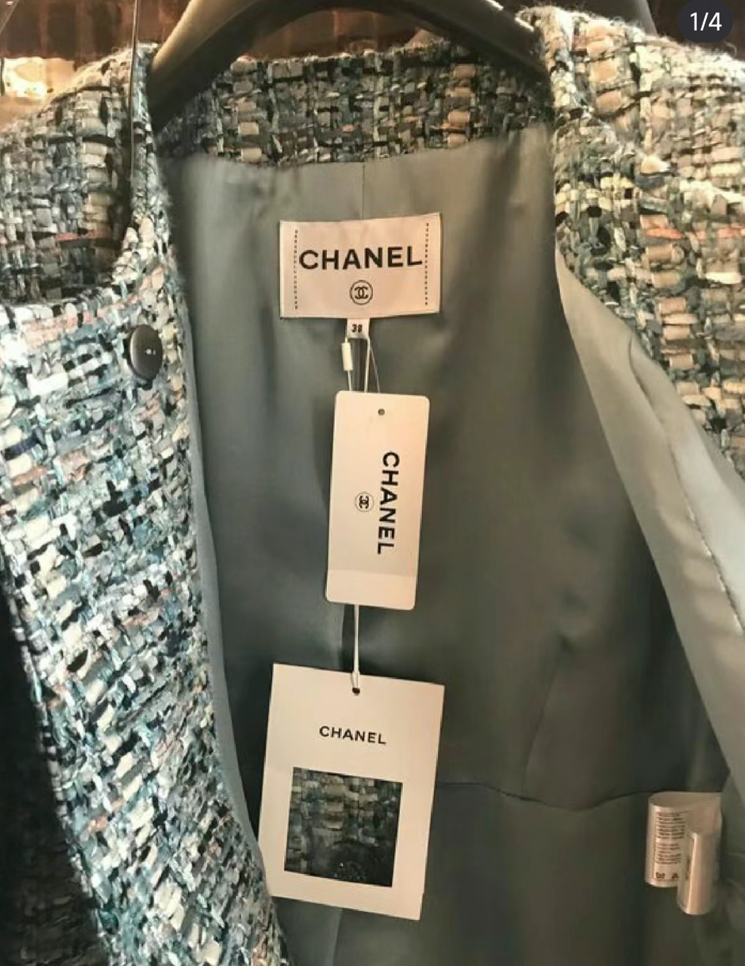 姐妹们衣服上的标可以造假吗水洗标是直接缝在大衣内侧的所以很多姐妹