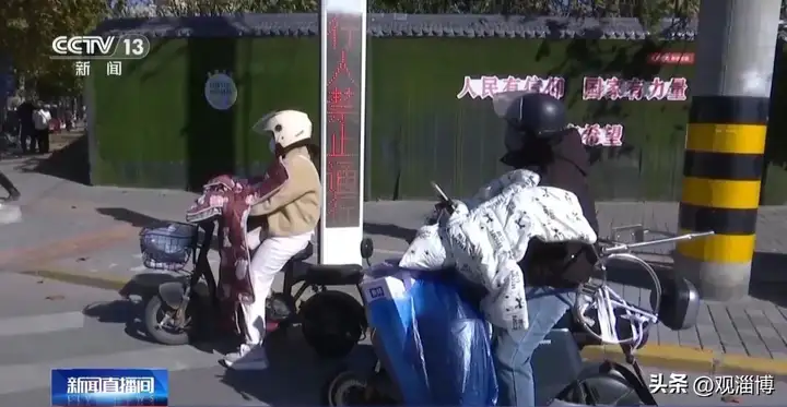 电动自行车“挡风被”到底该不该用，电动车“挡风被”藏风险插图1