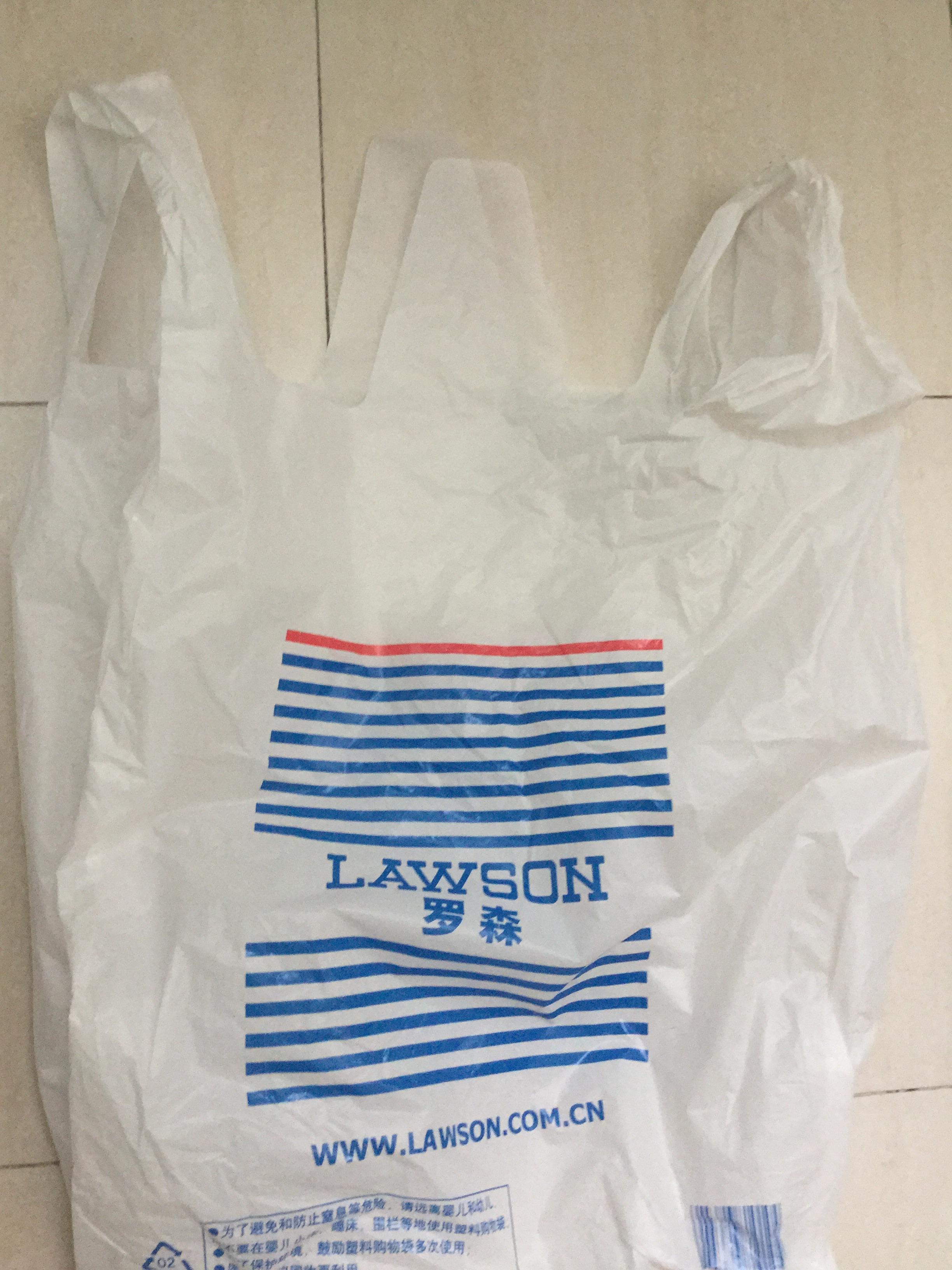 塑料袋两个提手中间那个耳朵有实际用处吗