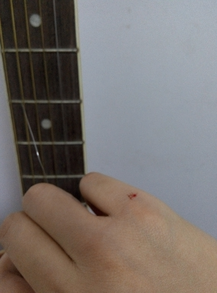 如何克服对吉他调音时调断弦的恐惧