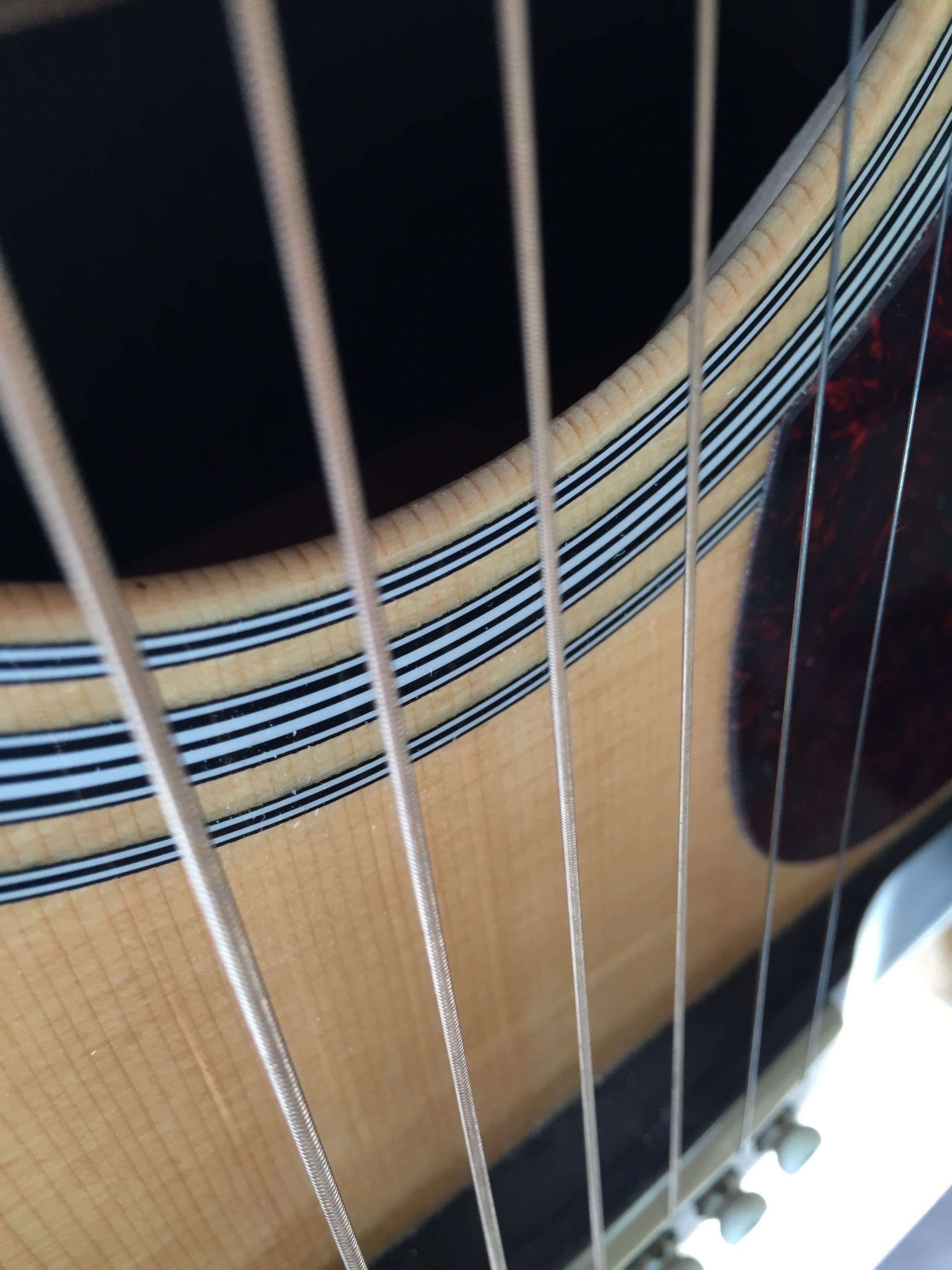 怎么看吉他面板是单板还是三合板