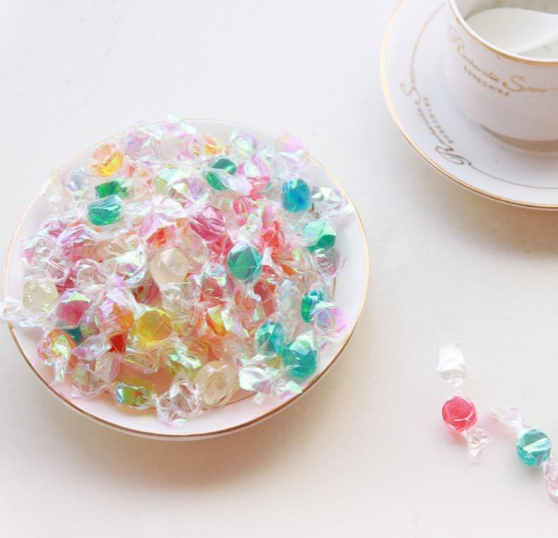 小时候吃的一种糖的糖纸,彩色透明的,塑料质感,有人知道这纸叫什么吗