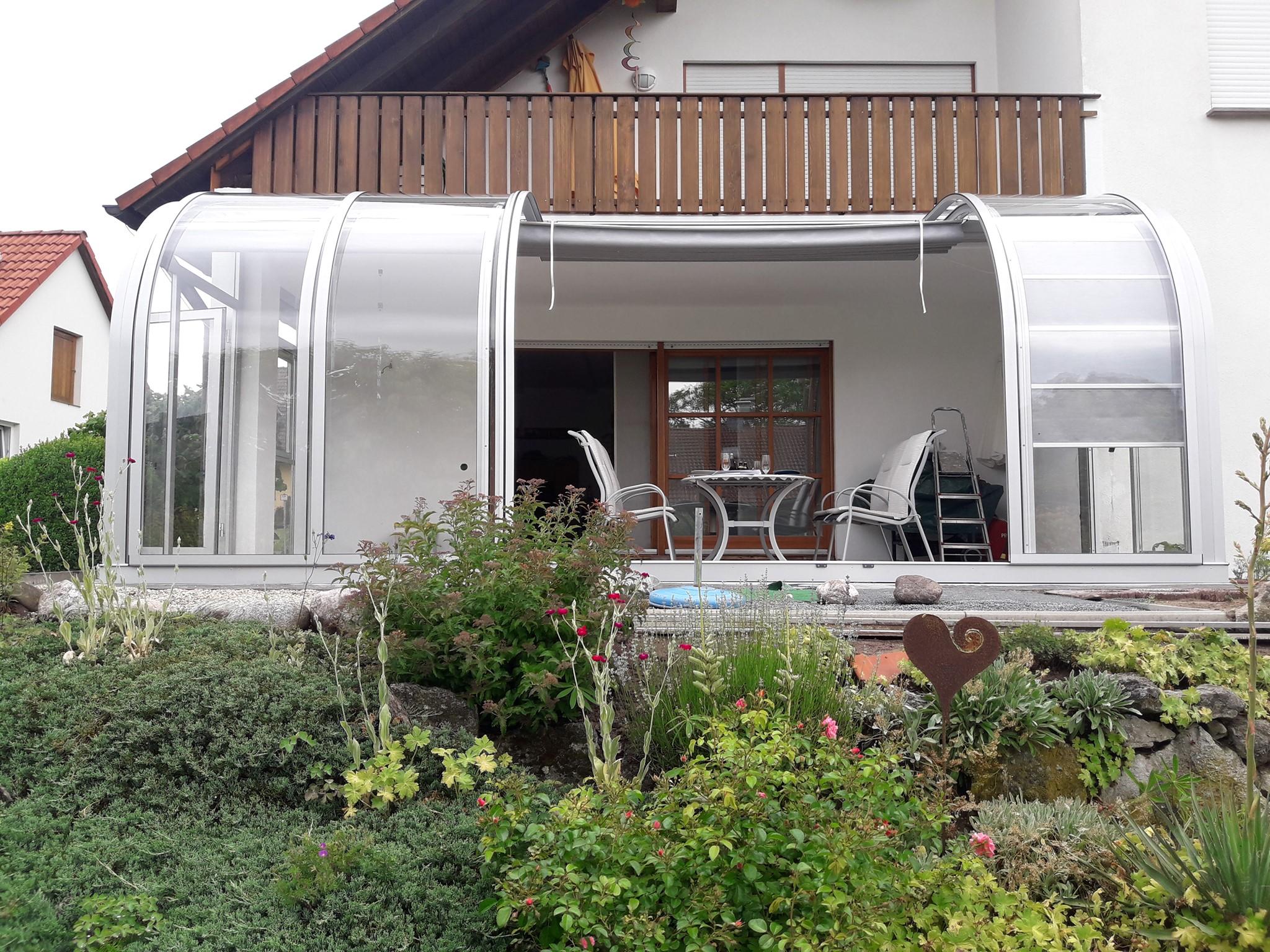 露台智能移动伸缩自如阳光房造价大概多少钱一平方米