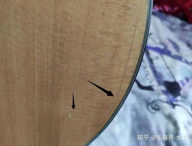 如何判断吉他是漆裂还是板裂