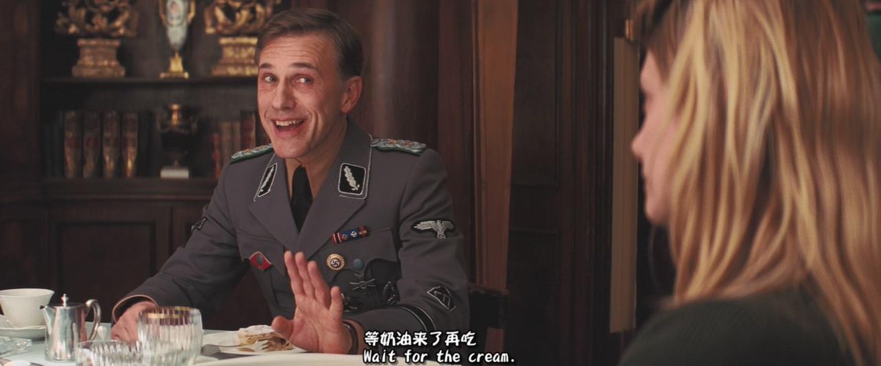 无耻混蛋里纳粹军官把烟头熄灭在甜点上这一幕有什么特别意义