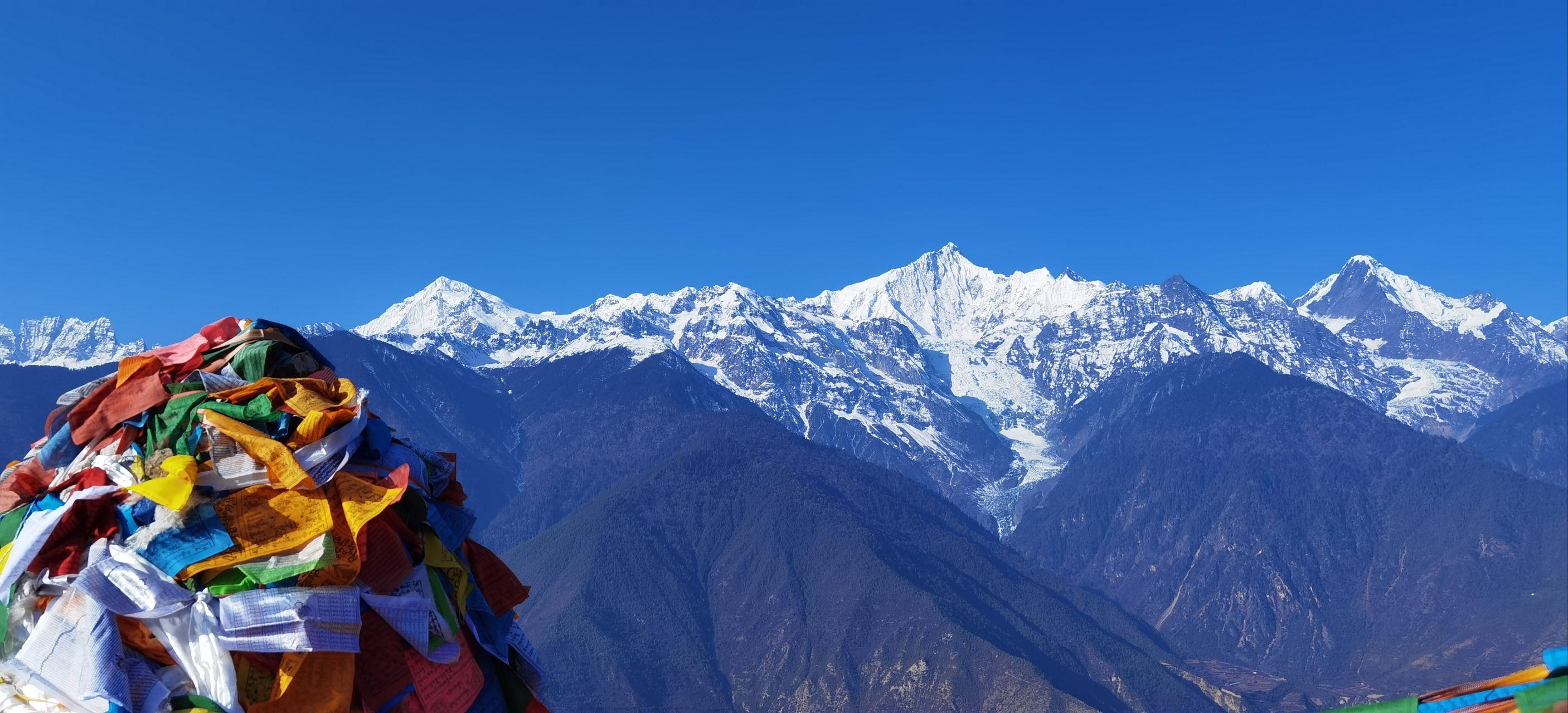 梅里雪山和玉龙雪山如何选择?各自有哪些推荐的理由? - 知乎