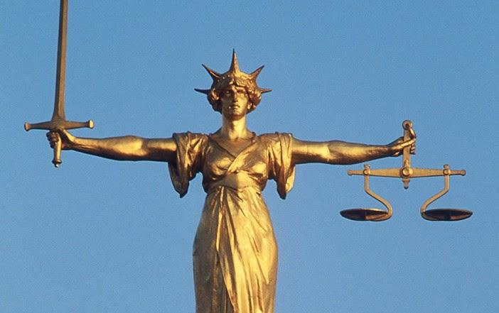正义女神为什么要蒙眼一手拿天平一手持剑其典故来由是什么