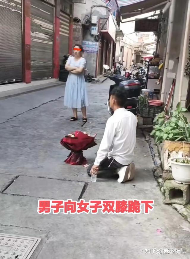 双膝下跪求婚图片