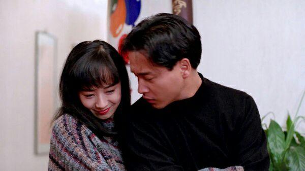 大家帮我看看张国荣亲的这个人是谁.或者有没有高清图片?,谢谢朋友们?