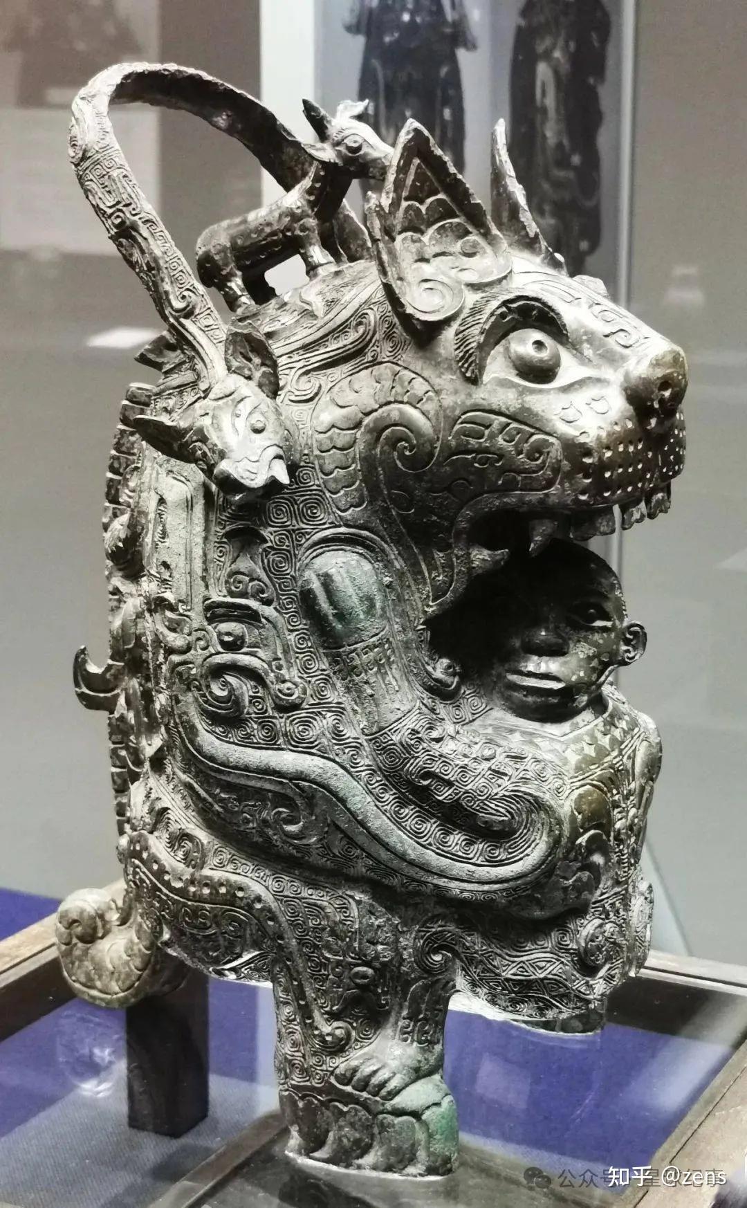 存世仅2件的虎食人卣，应该叫虎抱神人卣，身藏秘不示人的纹饰- 知乎