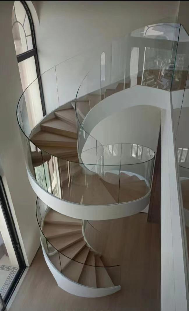 现代流行艺术玻璃楼梯护栏别墅定制弧形旋转楼梯扶手