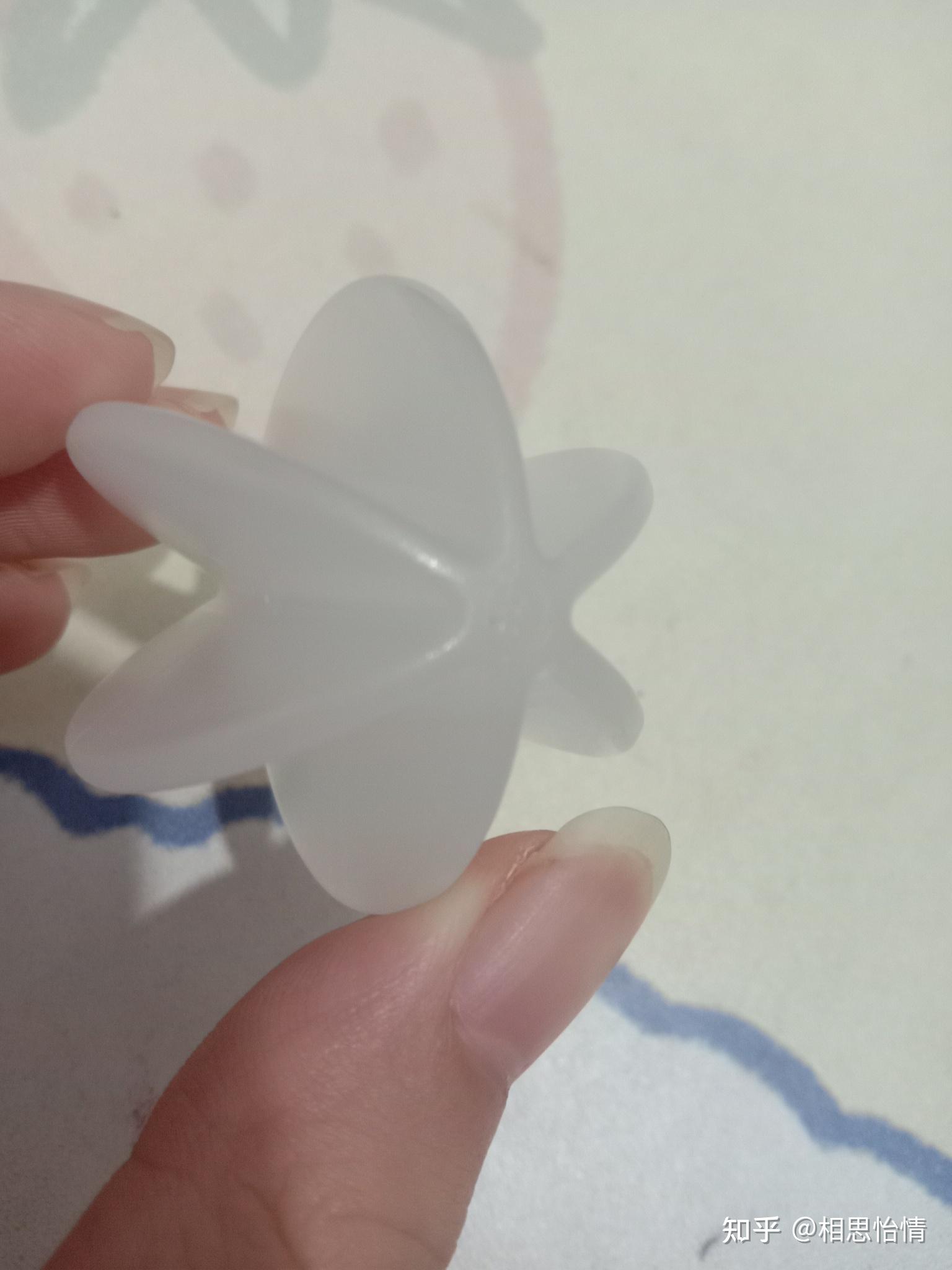 新买茶杯里面带一个白色的六菱形东西是干什么用的