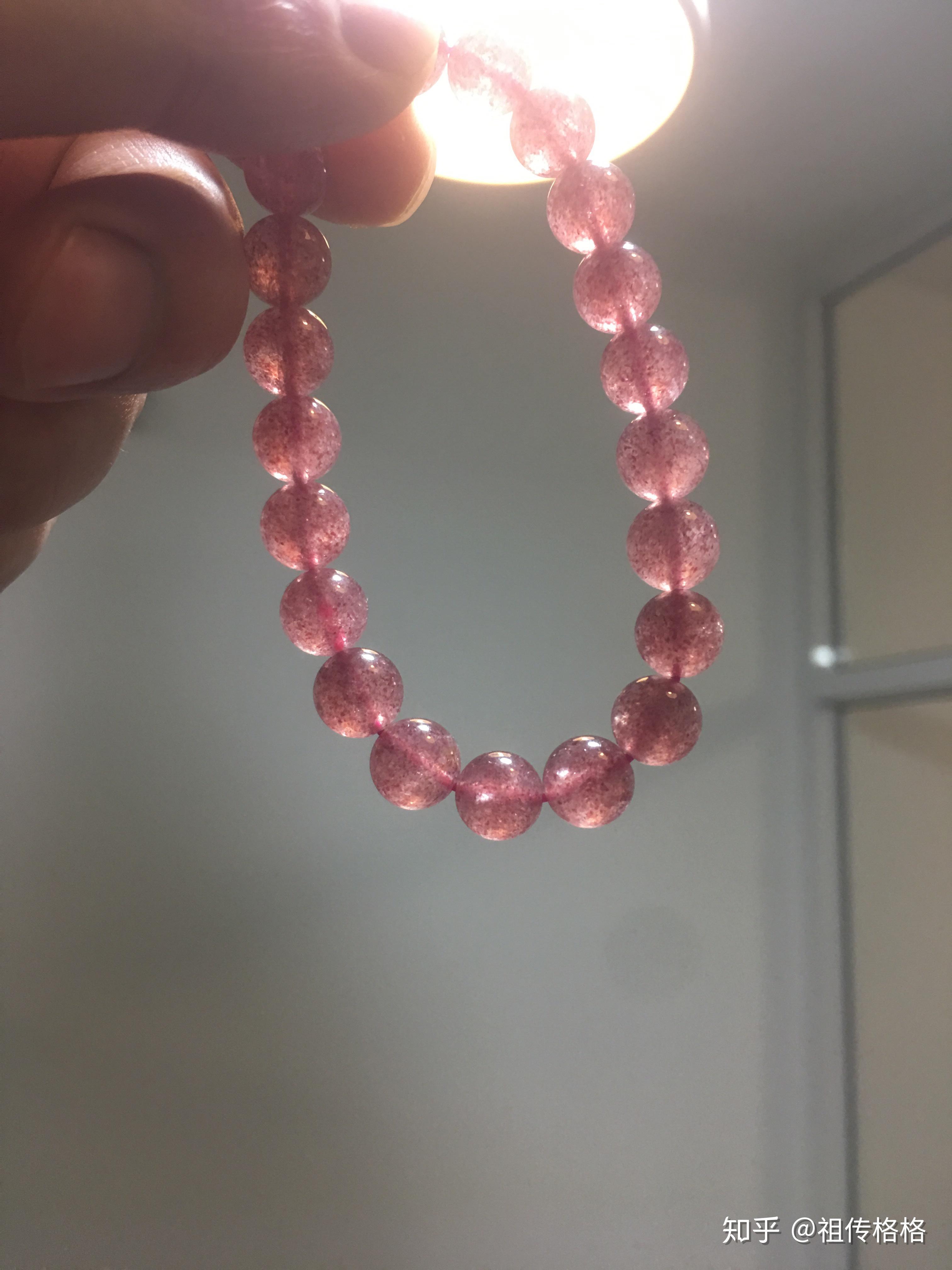 这个鸽血红的草莓晶是真的假的大概值多少钱