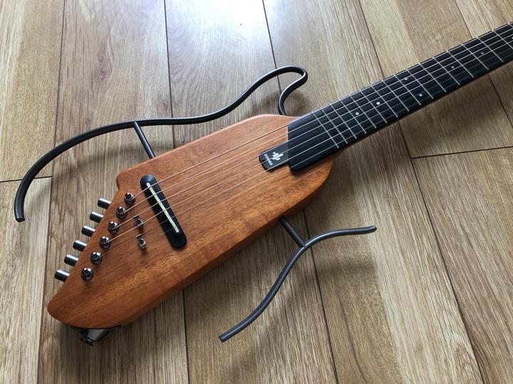 兼顾便携,静音,价格还便宜,应该也就donner唐农静音吉他了吧!