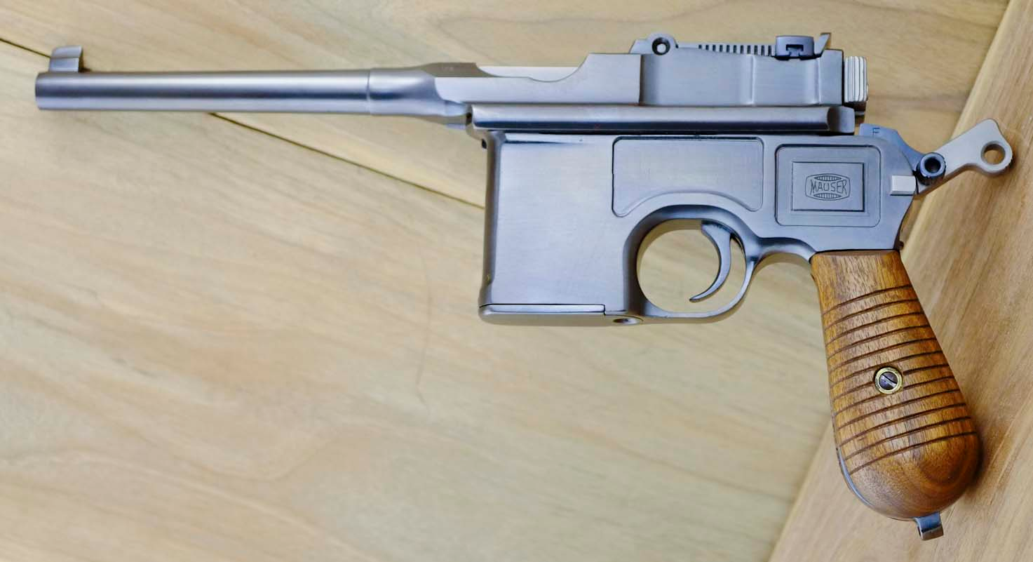 54手枪经久不衰的原因是什么,它的性能和驳壳枪相比如何?