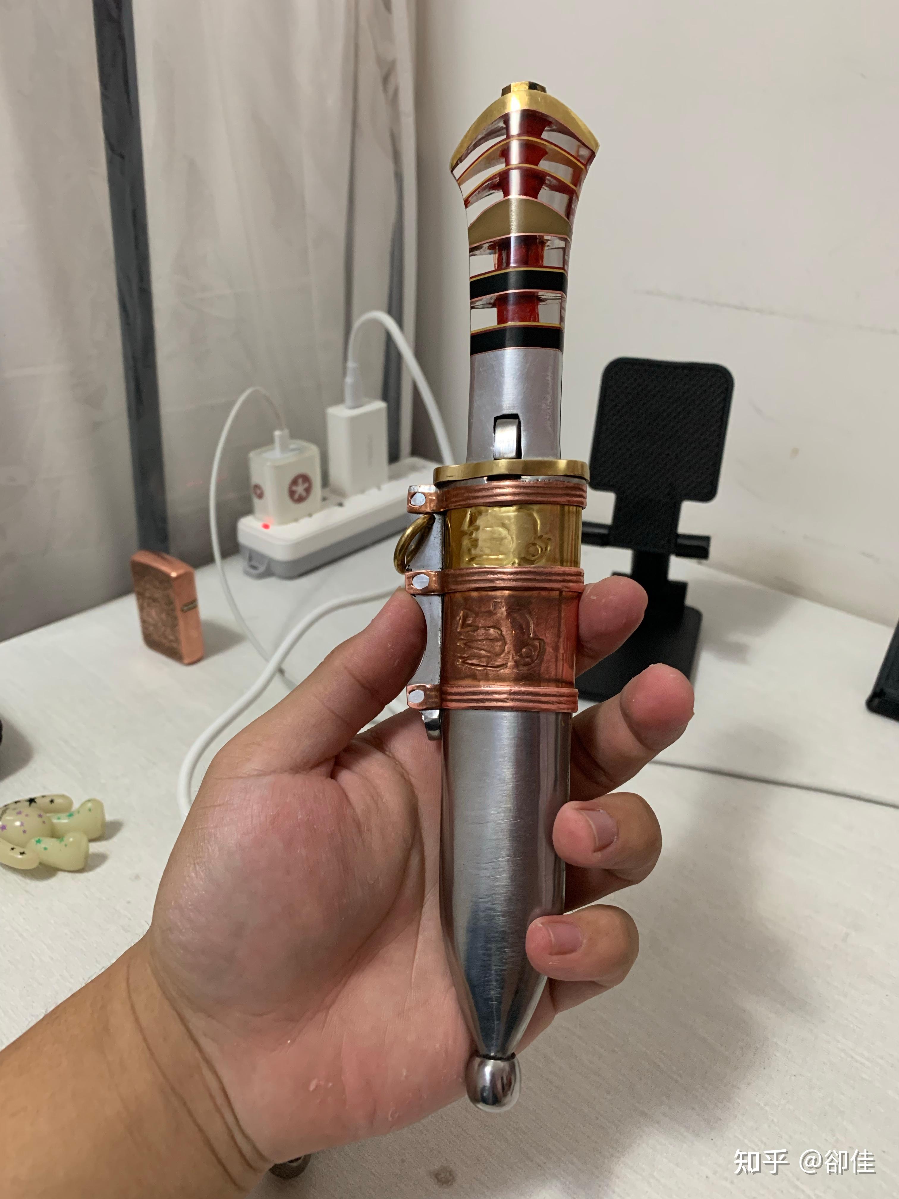 保安腰刀的"皇上头"刀鞘,鞘头的圆球球是怎么弄上去的?