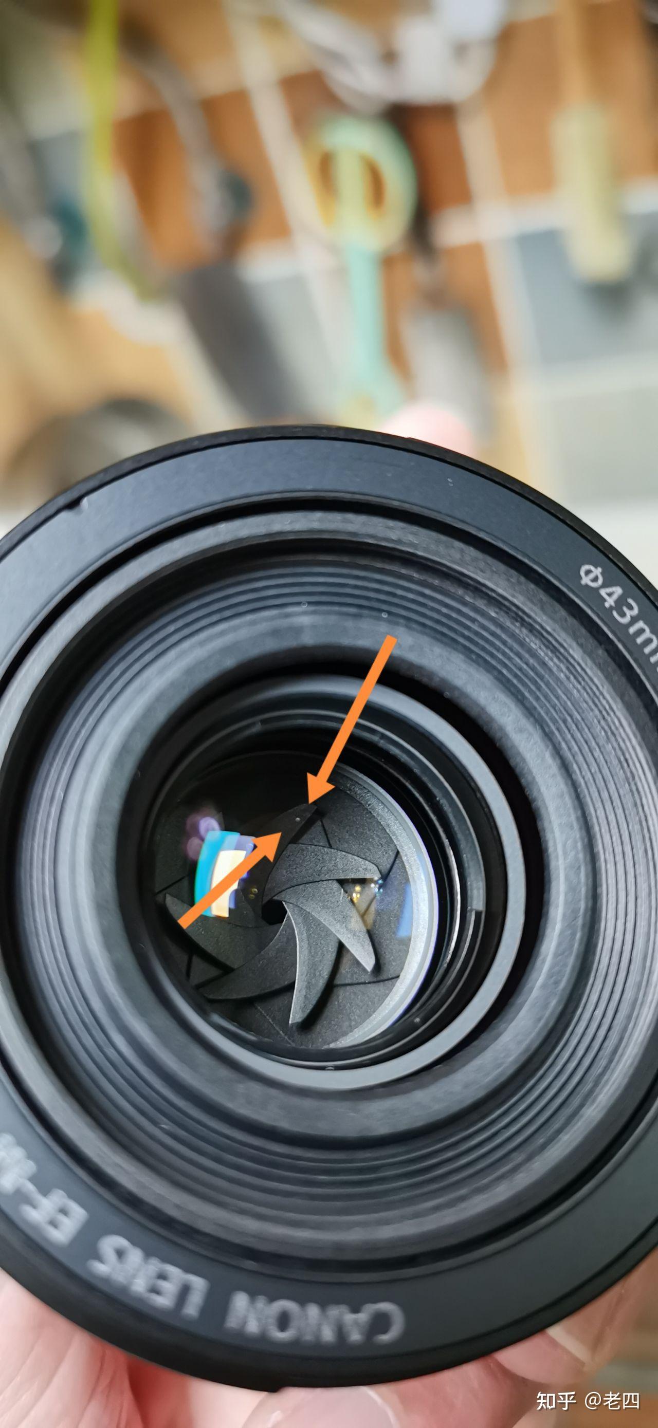 新买的镜头内部有灰尘正常吗? - 知乎