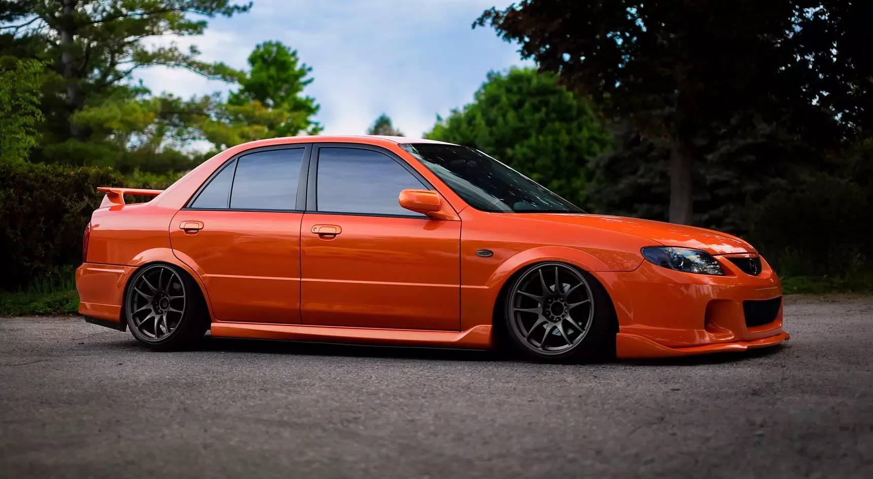 帮忙找一下这个马自达323用的什么包围 还有轮毂? - 知乎