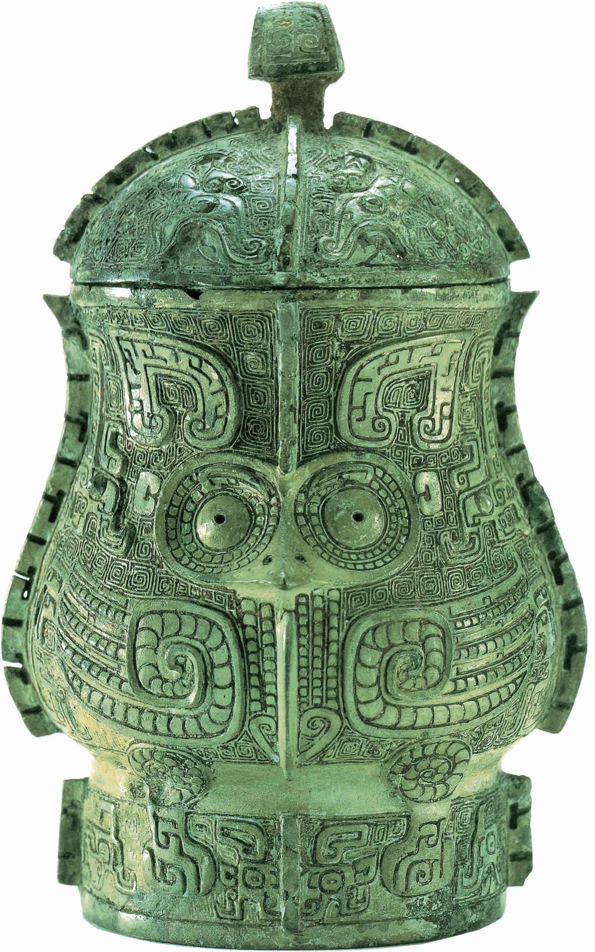 14-22 鸮(xiāo)纹觯(zhì) 商代晚期 高 19 厘米 传河南安阳出土