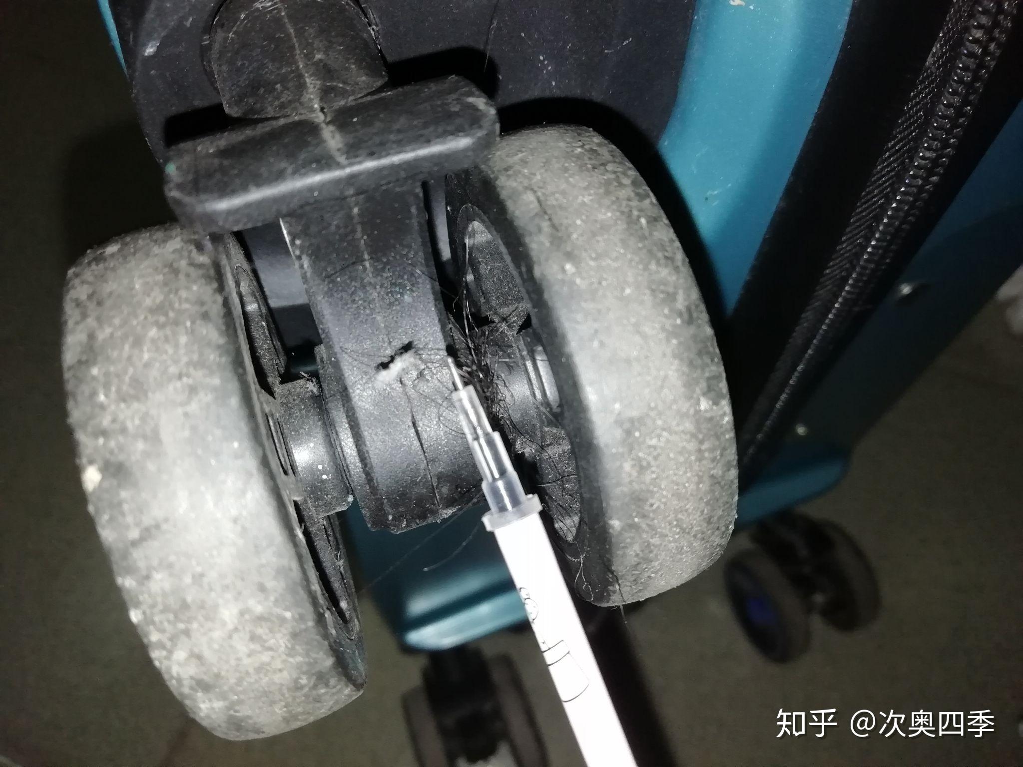 行李箱的万向轮被头发缠住了怎么办? - 知乎