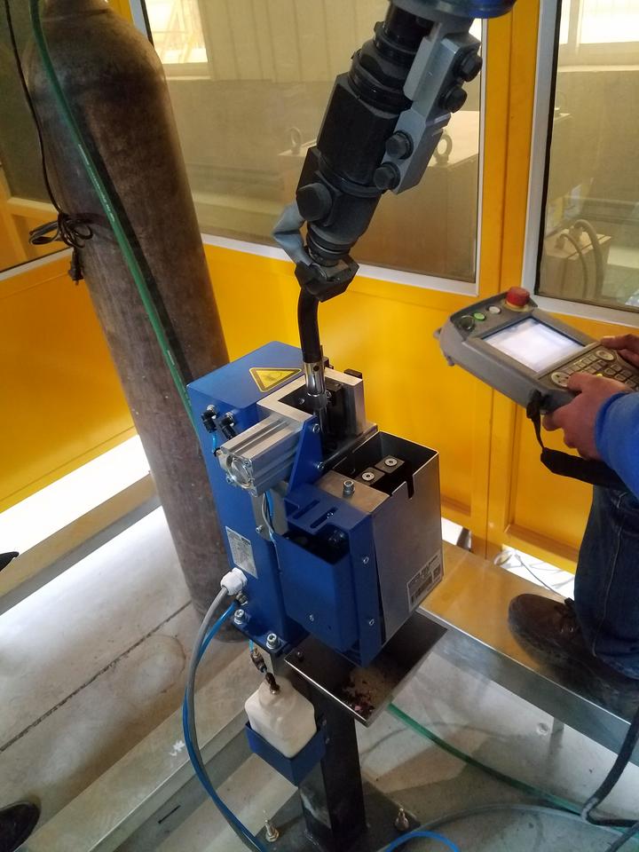 机器人焊枪清枪器:焊接自动化领域的关键推动者