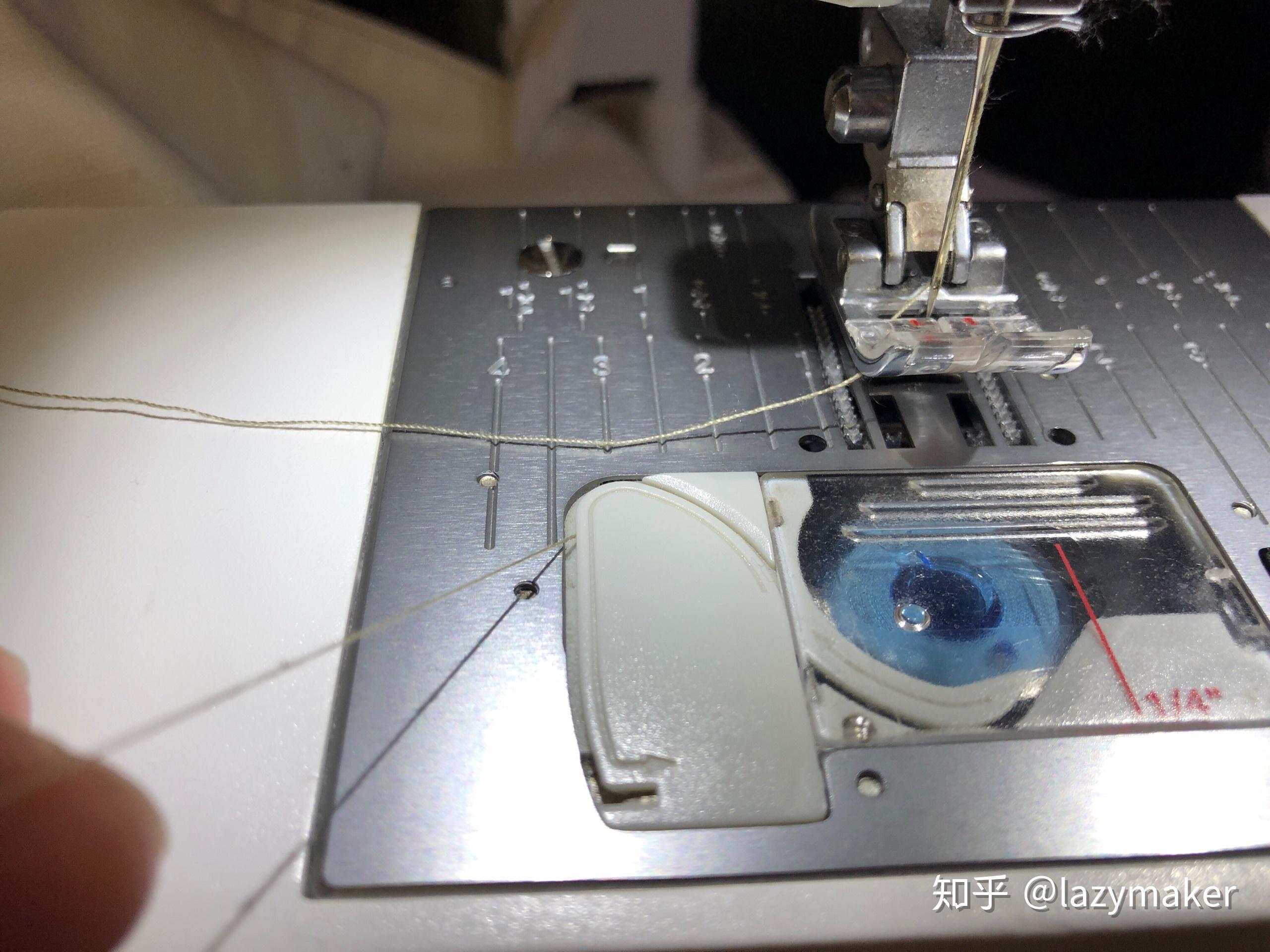 电脑缝纫机倒针的时候,背面总是一大堆线.是怎么回事?怎么调?