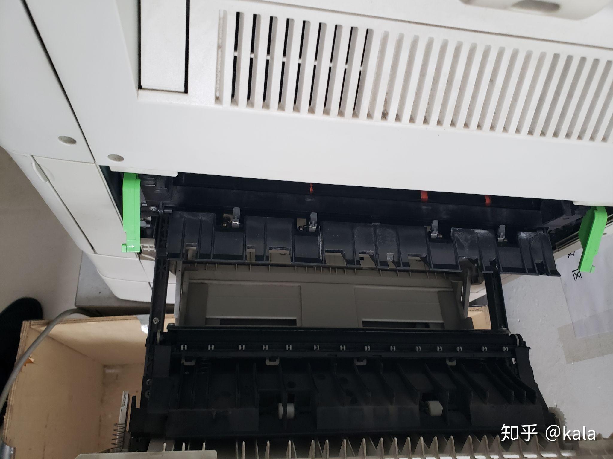 打印机卡纸给我不小心弄成这样了怎么取出来型号为docucentres2011